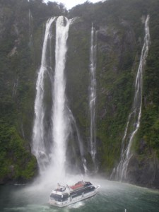 Another boat getting a close up of the water falls